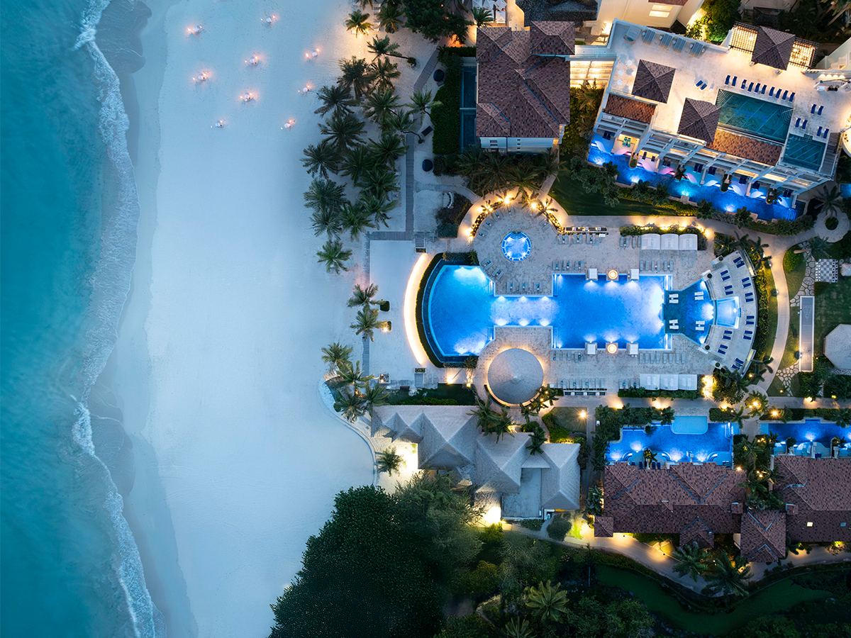 Resort pool and beachfront property