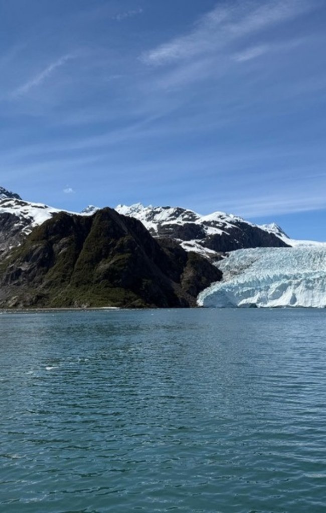 A glacier meeting icy water in Kenai Fjords National Park