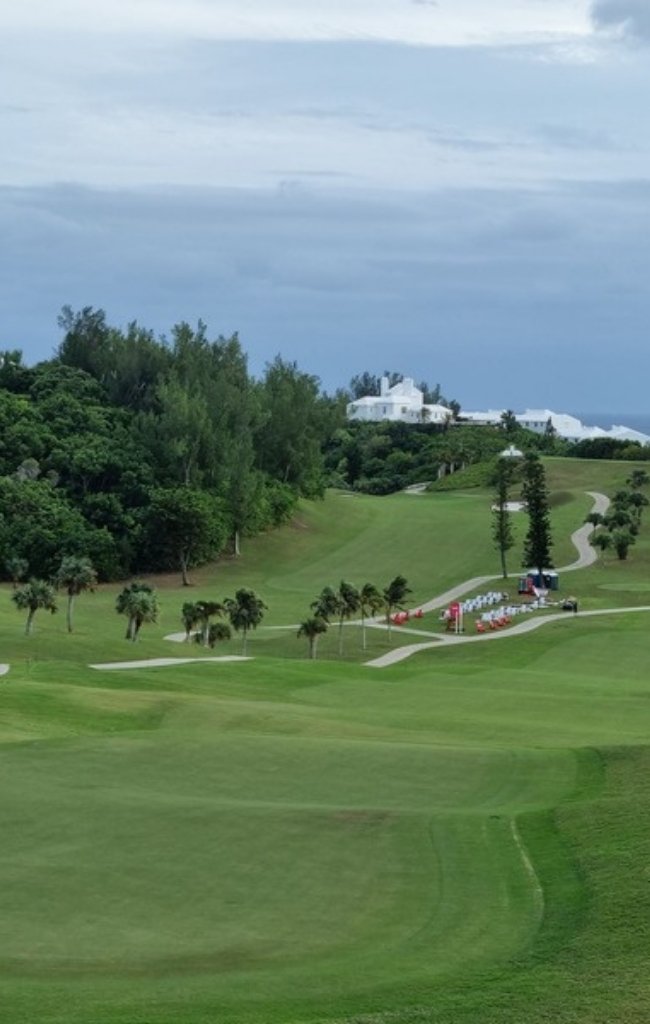 Rolling green fairways above the sea on a Bermuda golf course