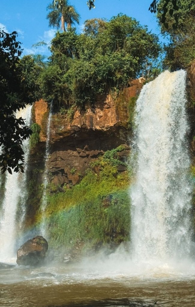 Twin waterfalls and a rainbow at Iguazú Falls