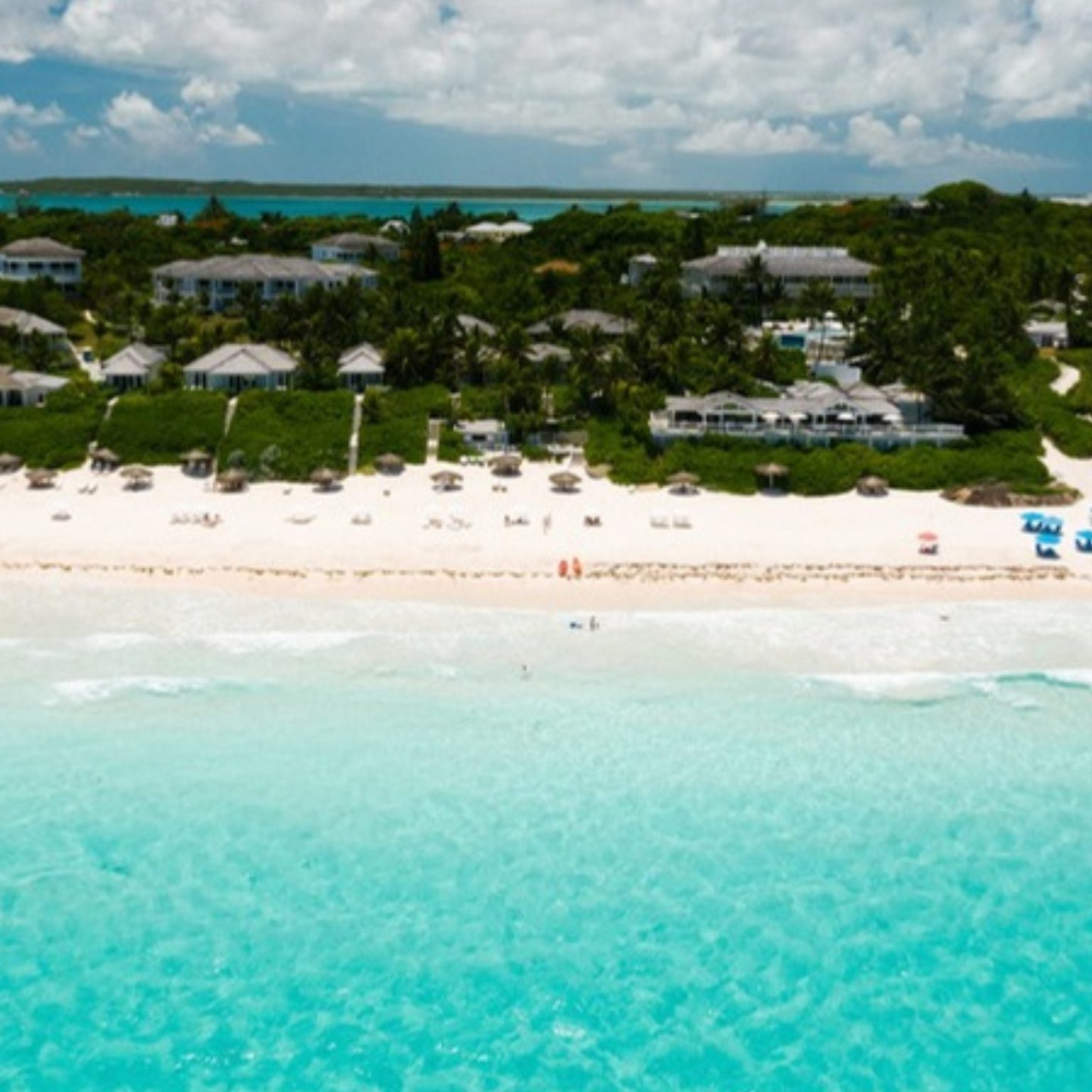 Aerial view of a pale sand beach in the Bahamas