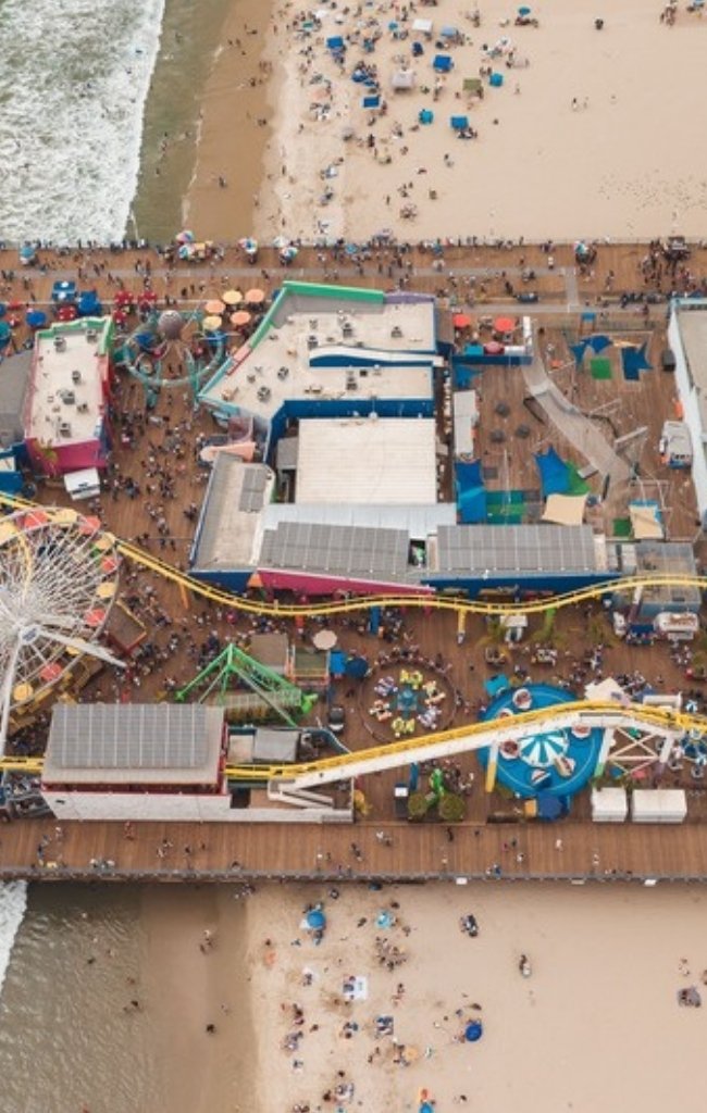 An aerial view of Santa Monica Pier above the beach