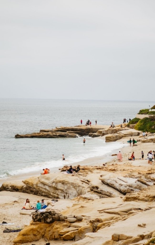 Rocky tide pools and a sandy cove in La Jolla