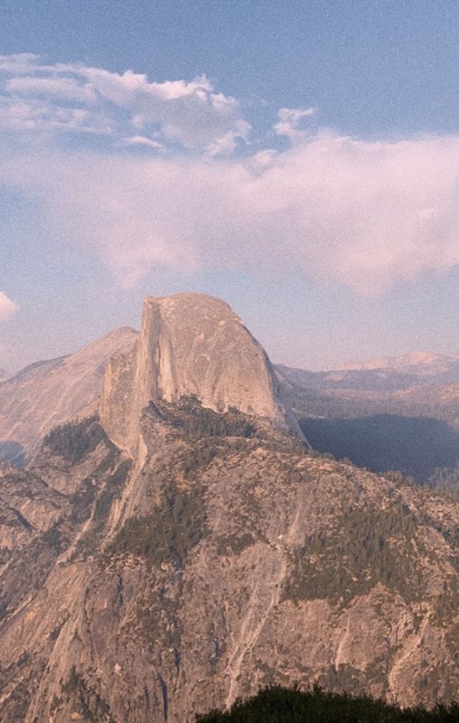 Half Dome rising above Yosemite Valley at dusk