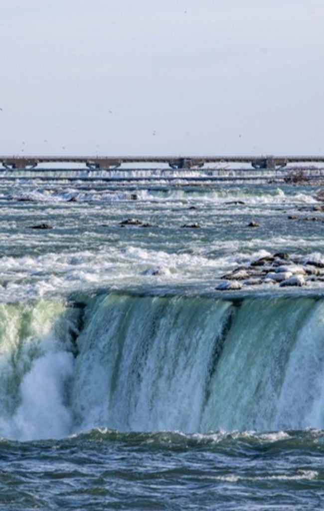 Niagara Falls under a clear sky