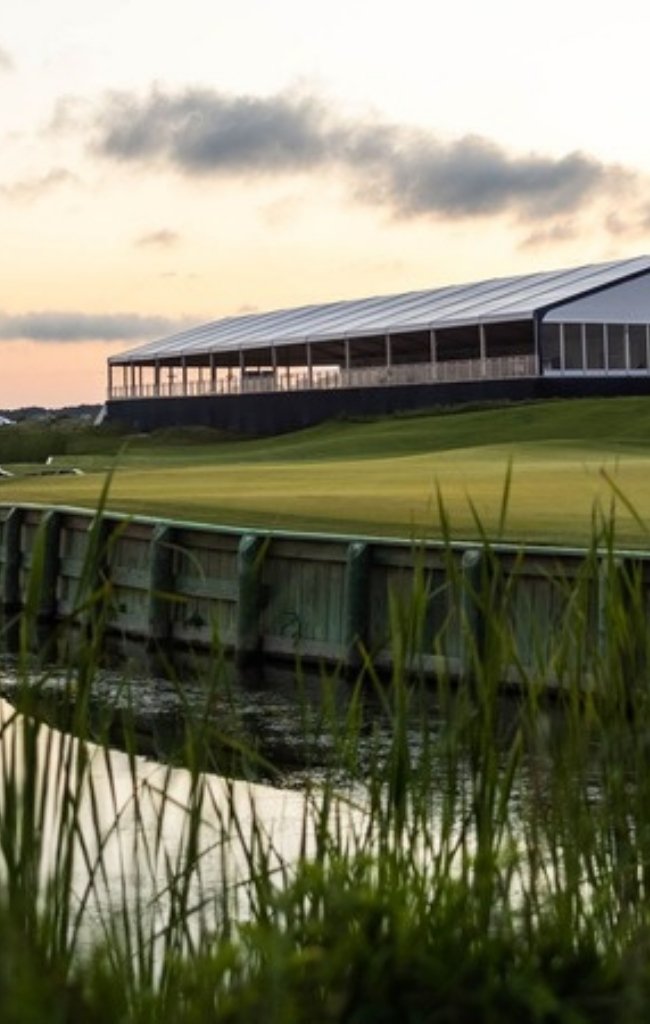 A seaside golf course and clubhouse at dusk on Kiawah Island