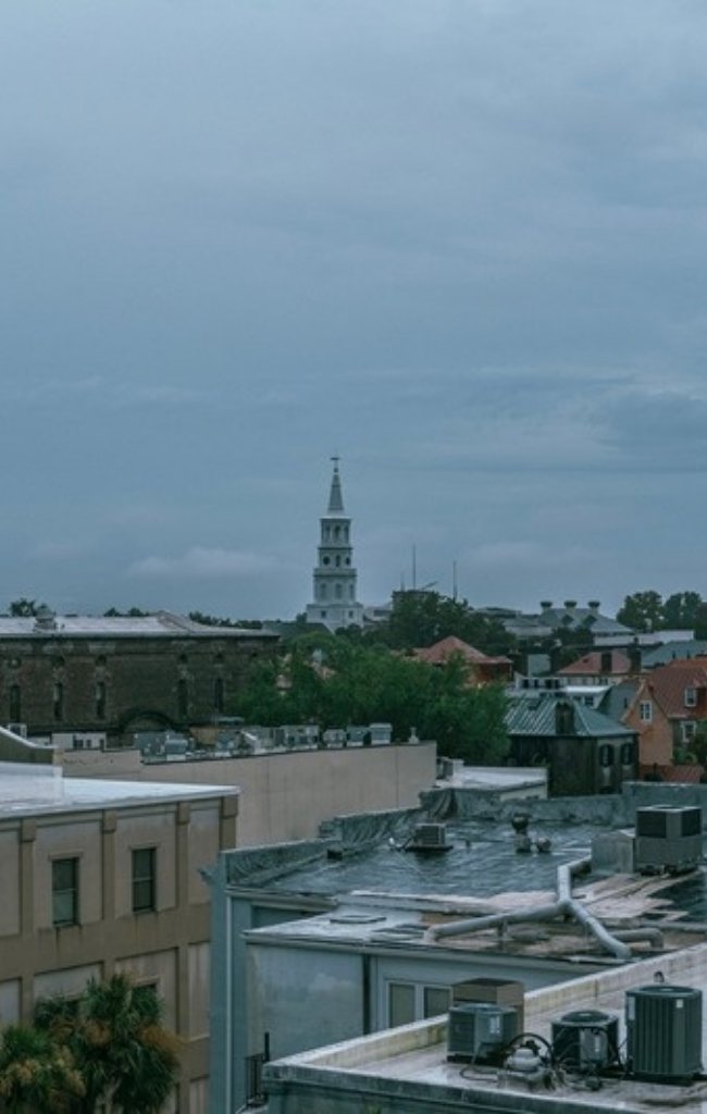 Church steeples rising above the rooftops of Charleston