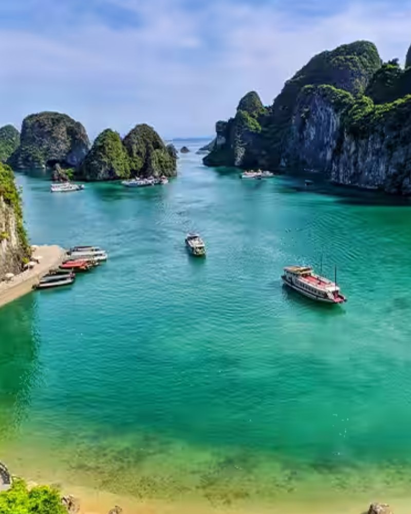 Boats among limestone islands in Ha Long Bay, Vietnam