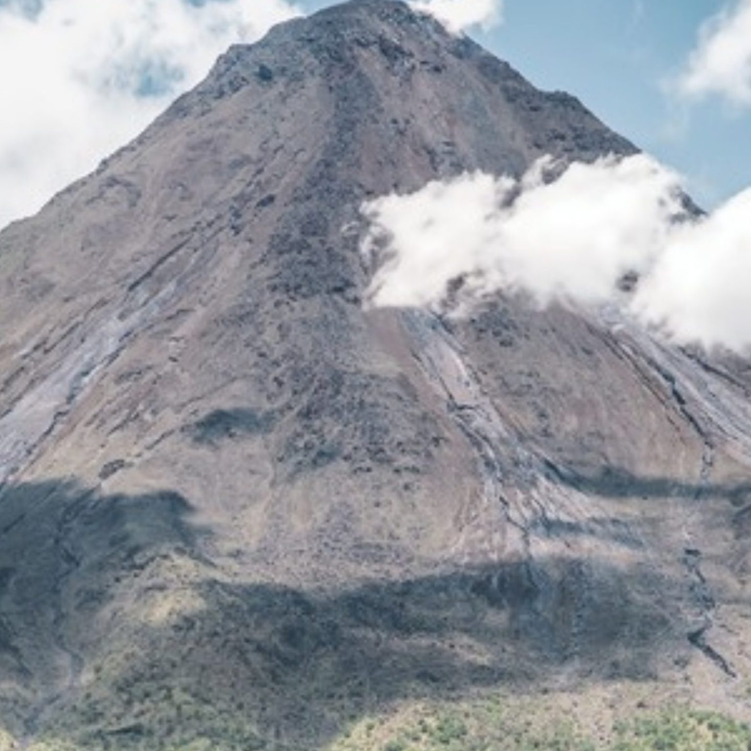 Arenal Volcano above rainforest in Costa Rica