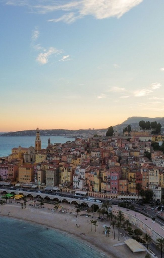 The pastel houses of Menton on the Mediterranean at sunset