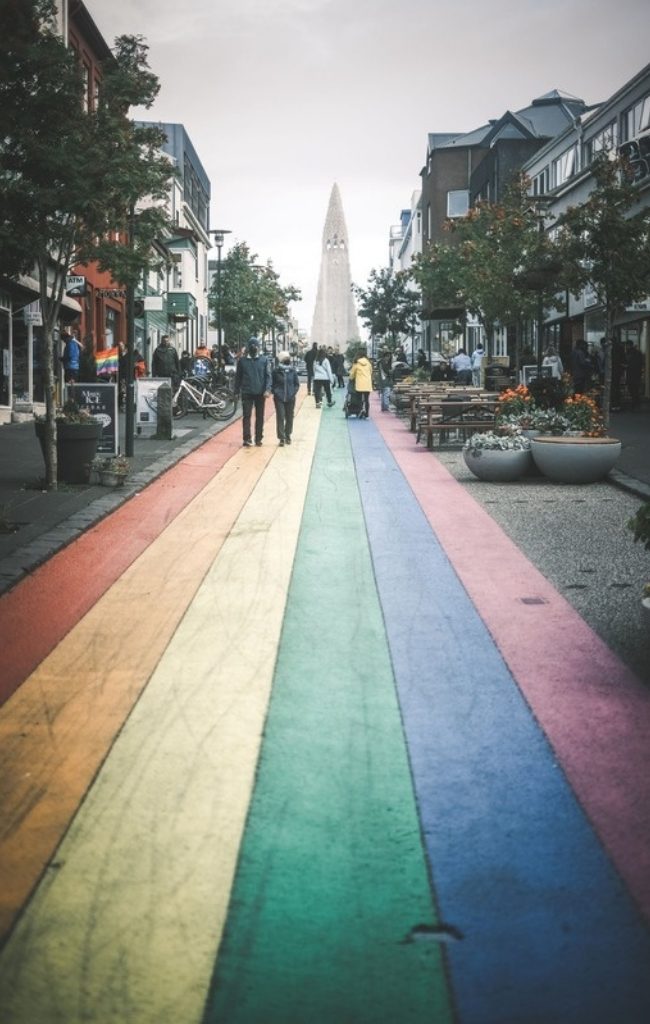 A colorful street in Reykjavik leading to Hallgrimskirkja church