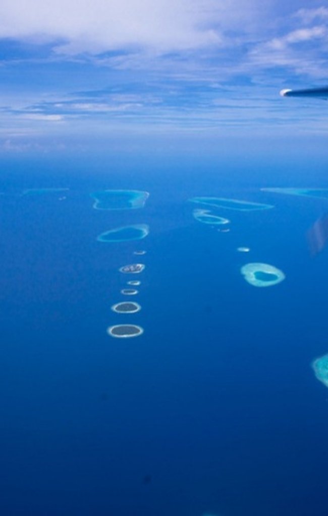 Atolls seen from a seaplane over the Indian Ocean