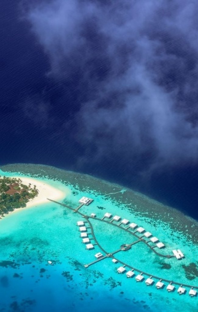 A resort island ringed by turquoise water