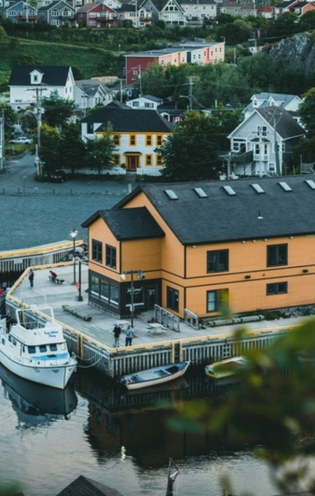 An aerial view of the harbour and colorful houses of Quidi Vidi in St. John's