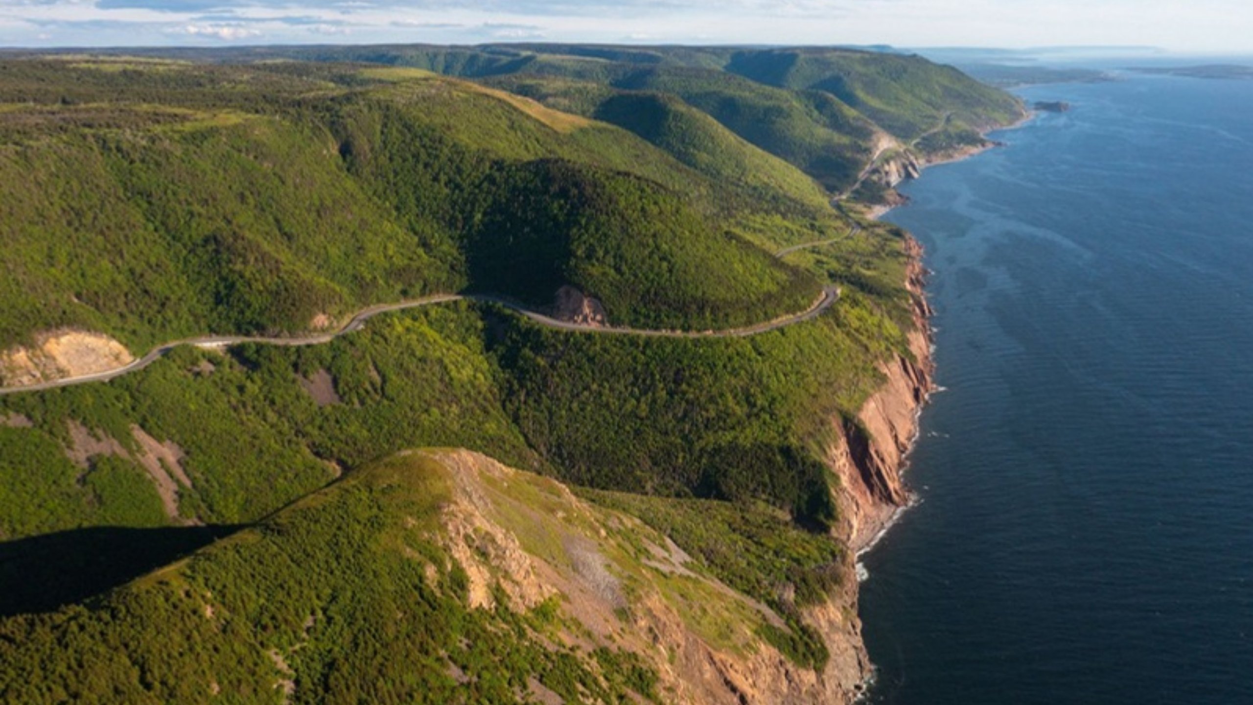 The Cabot Trail winding along the cliffs of the Cape Breton Highlands