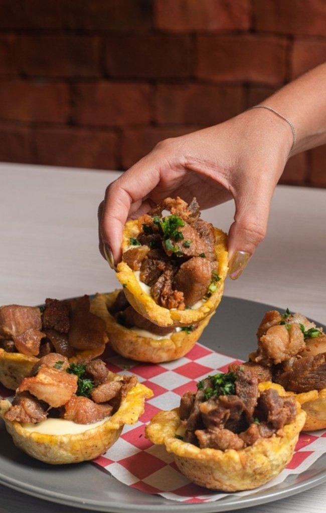 Plantain cups filled with savory stewed meat