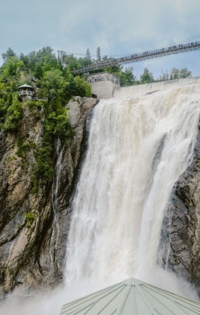 Montmorency Falls plunging down a rocky cliff near Quebec City