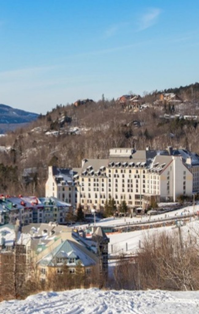 A gondola above the snowy village of Mont-Tremblant