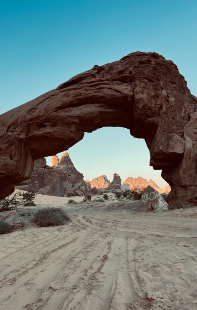 A natural sandstone arch in the Saudi desert