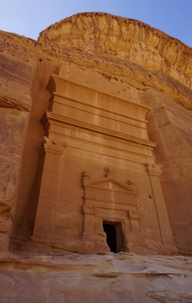 A carved tomb facade at Hegra, Saudi Arabia's first UNESCO World Heritage Site