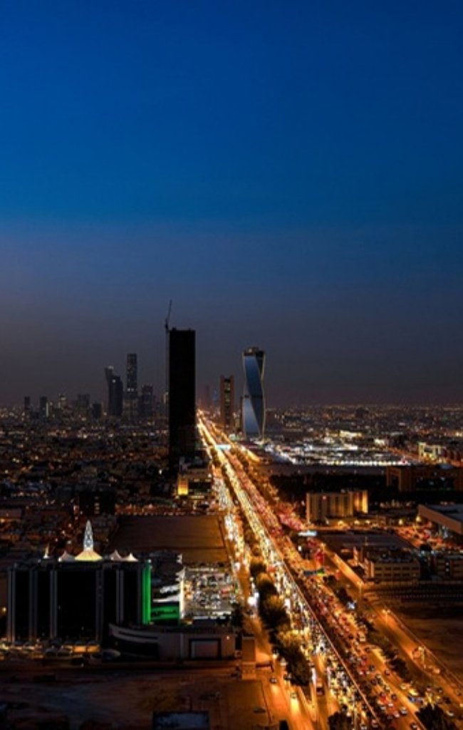 The Riyadh skyline lit up at twilight