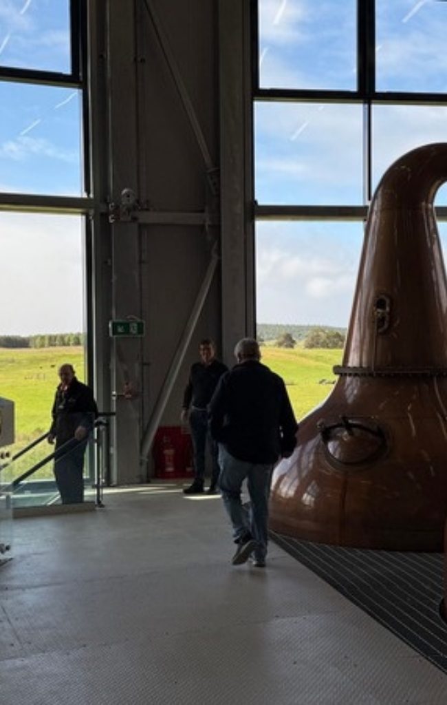 Copper stills inside a Scotch whisky distillery