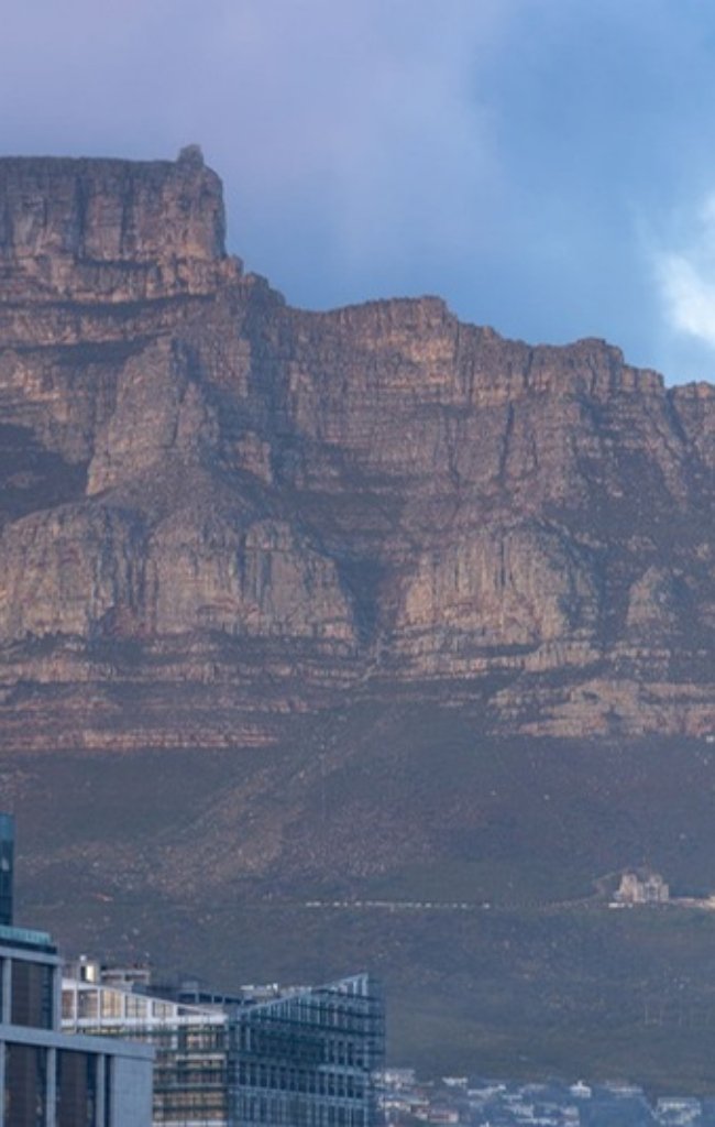 The cliffs of Table Mountain above Cape Town at dusk