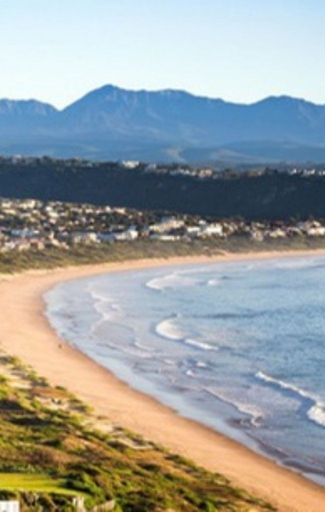 The curving beach and bay of Plettenberg Bay on the Garden Route