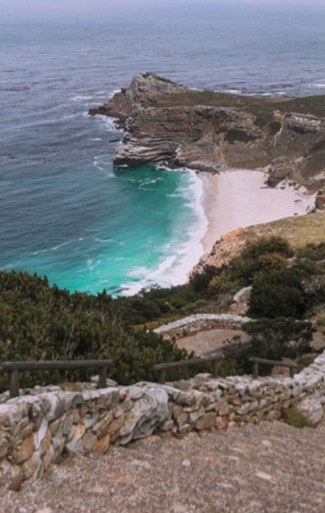 A white sand cove below the cliffs at Cape Point