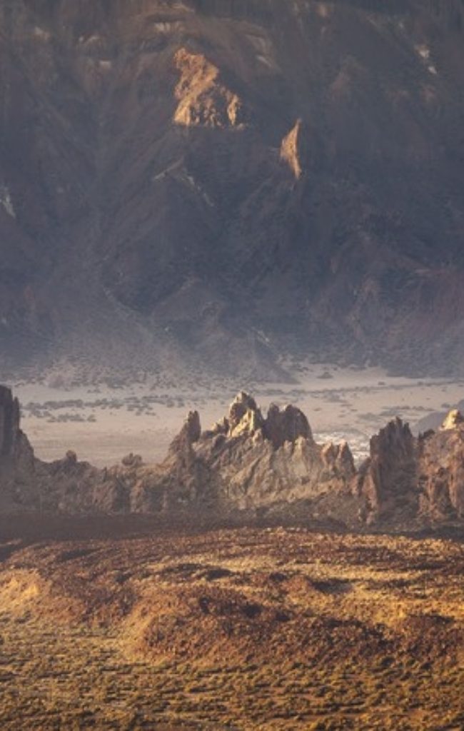 Volcanic rock formations at sunset in Teide National Park