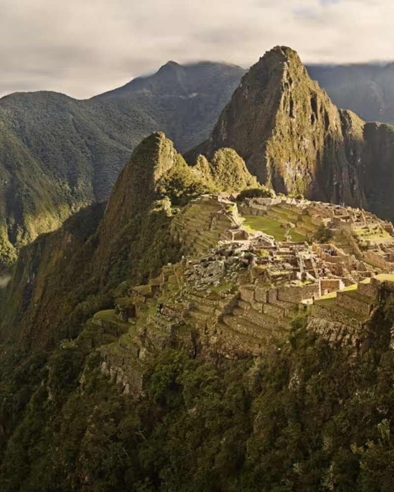 Machu Picchu citadel and Huayna Picchu in late afternoon light