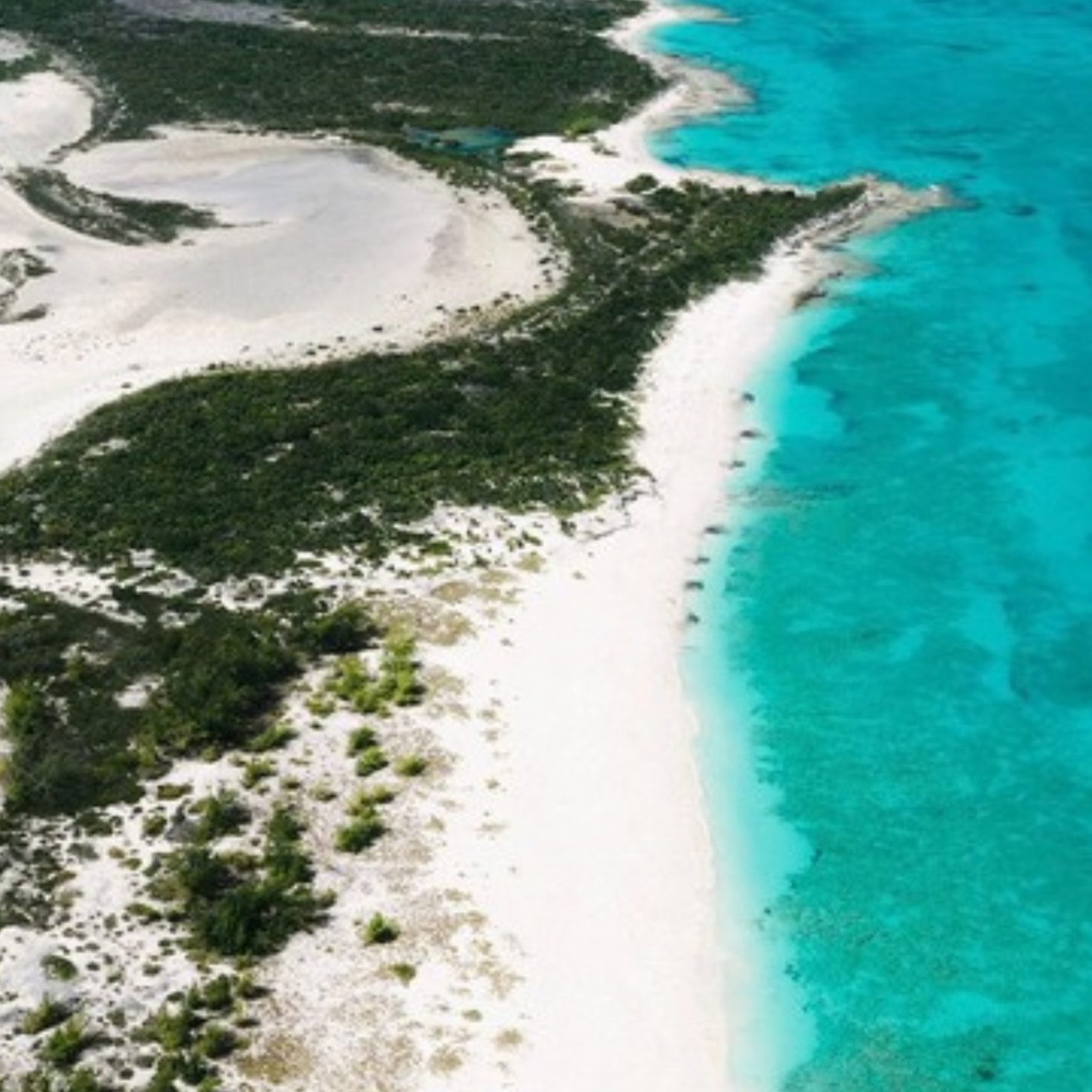 Aerial view of a white sand cay in Turks and Caicos