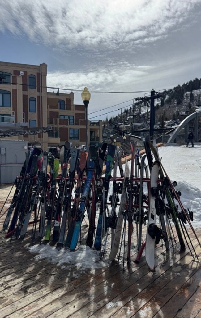Skis by a snowy slope in Park City