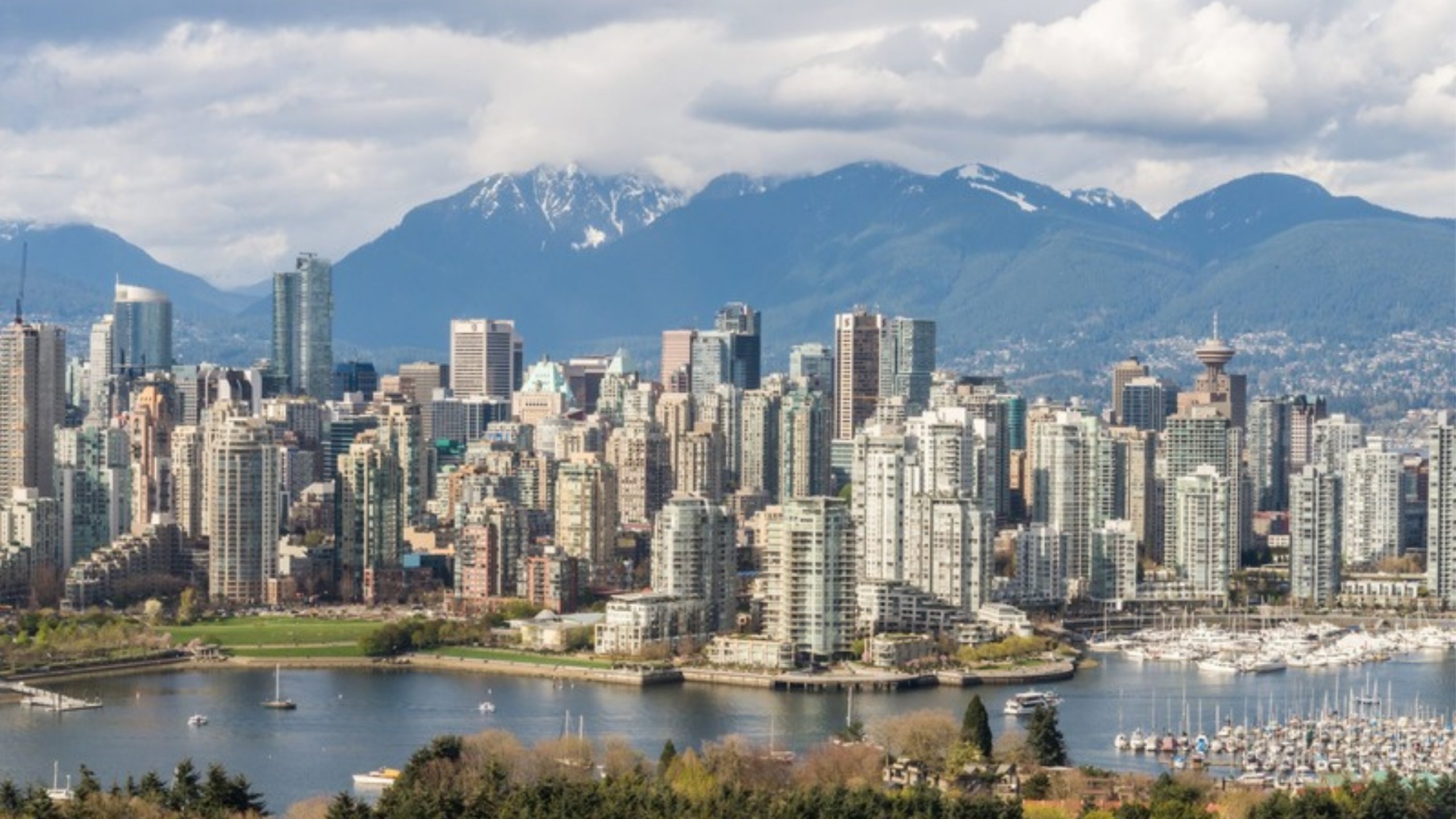 The Vancouver skyline below the snow-capped North Shore Mountains