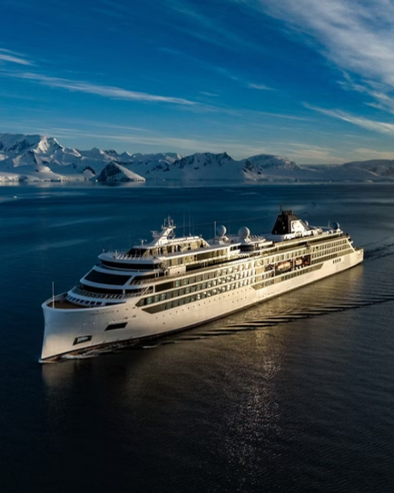 The expedition ship Viking Octantis under the midnight sun in Antarctica