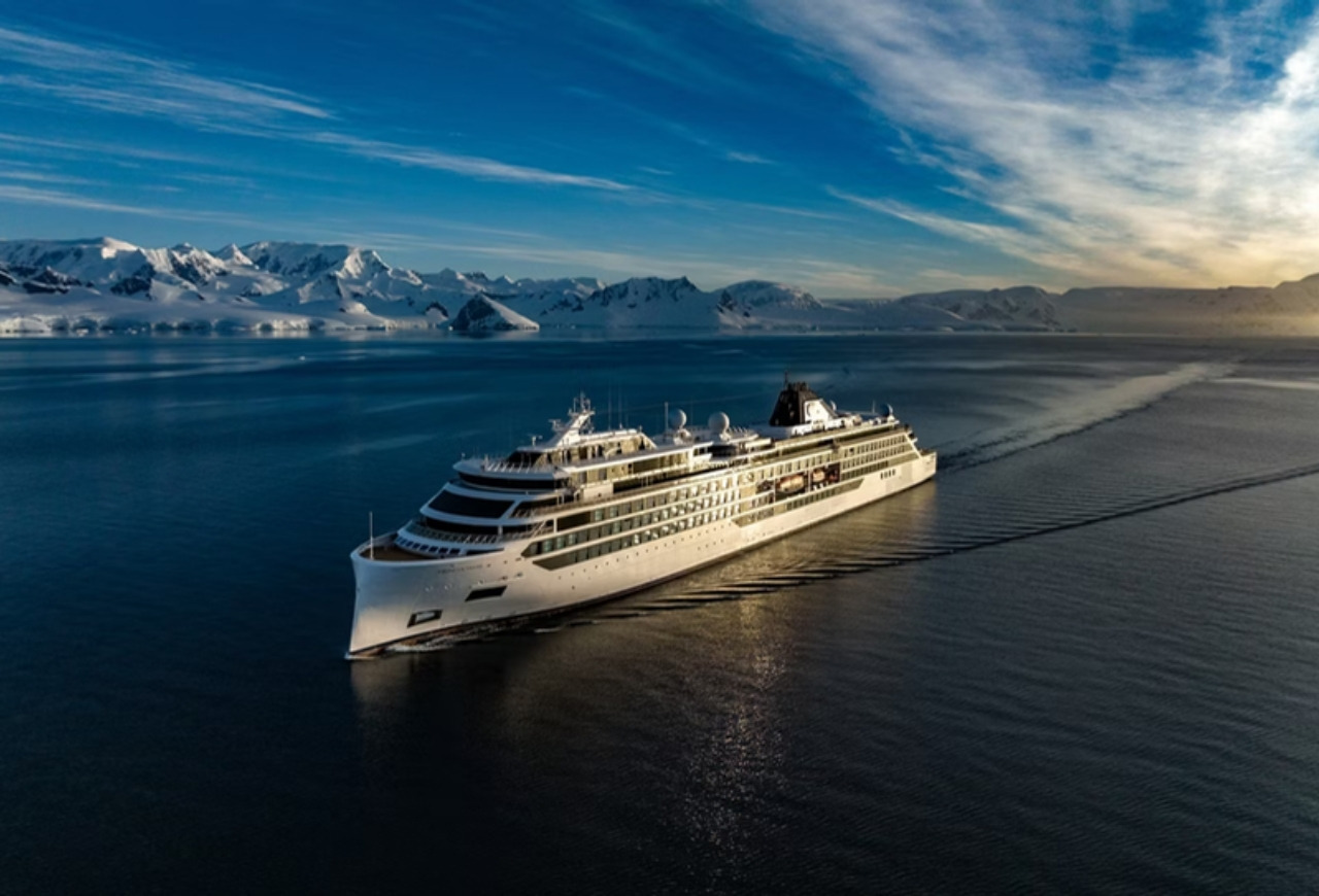 The expedition ship Viking Octantis under the midnight sun in Antarctica